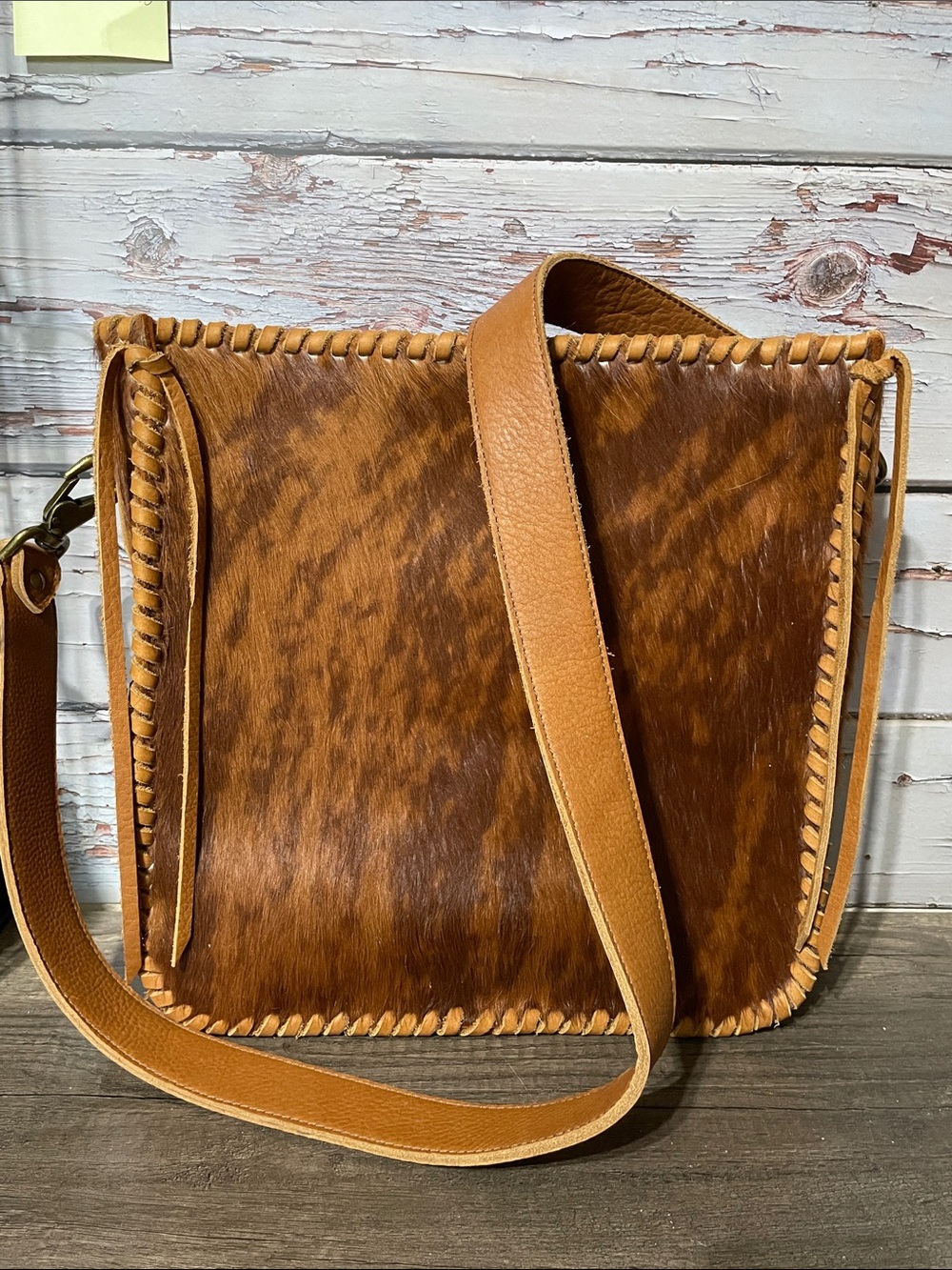 Leather and Hair on Hide Saddle Crossbody Bag in Brown. NWOT.